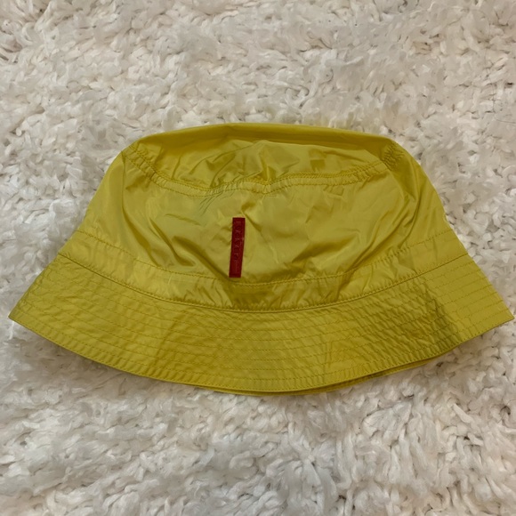 prada bucket hat yellow